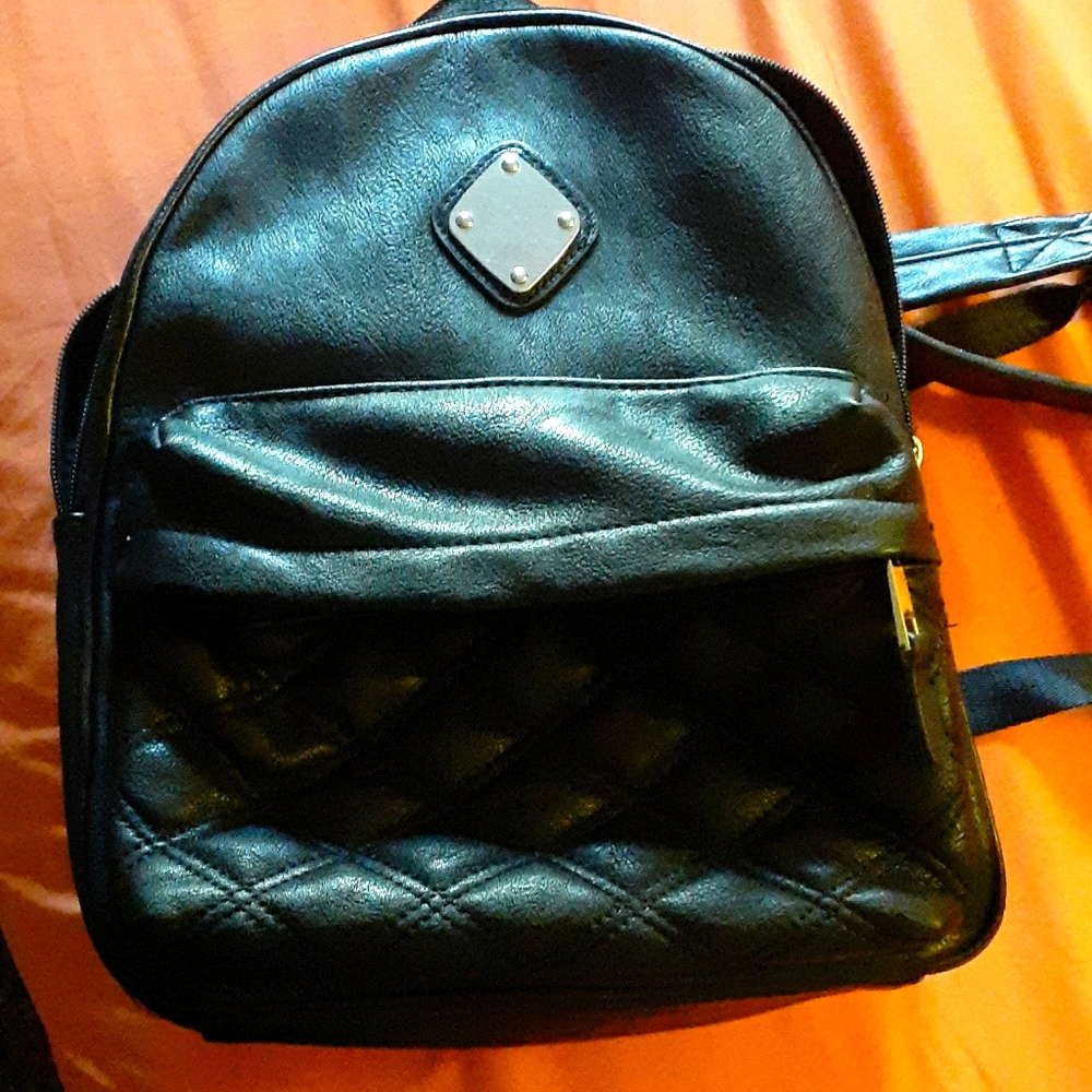 Black backpack purse